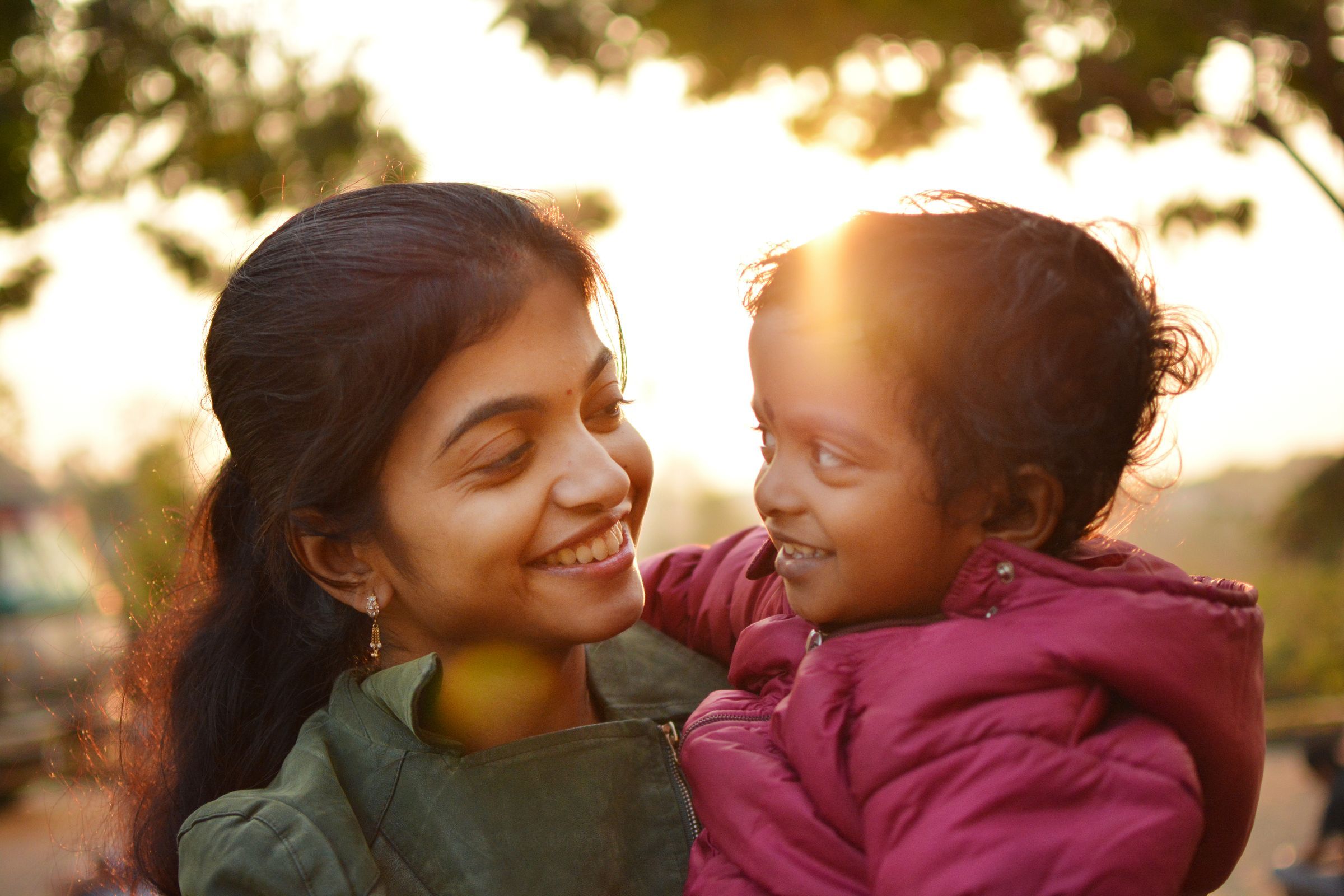 A mother and child in golden evening light