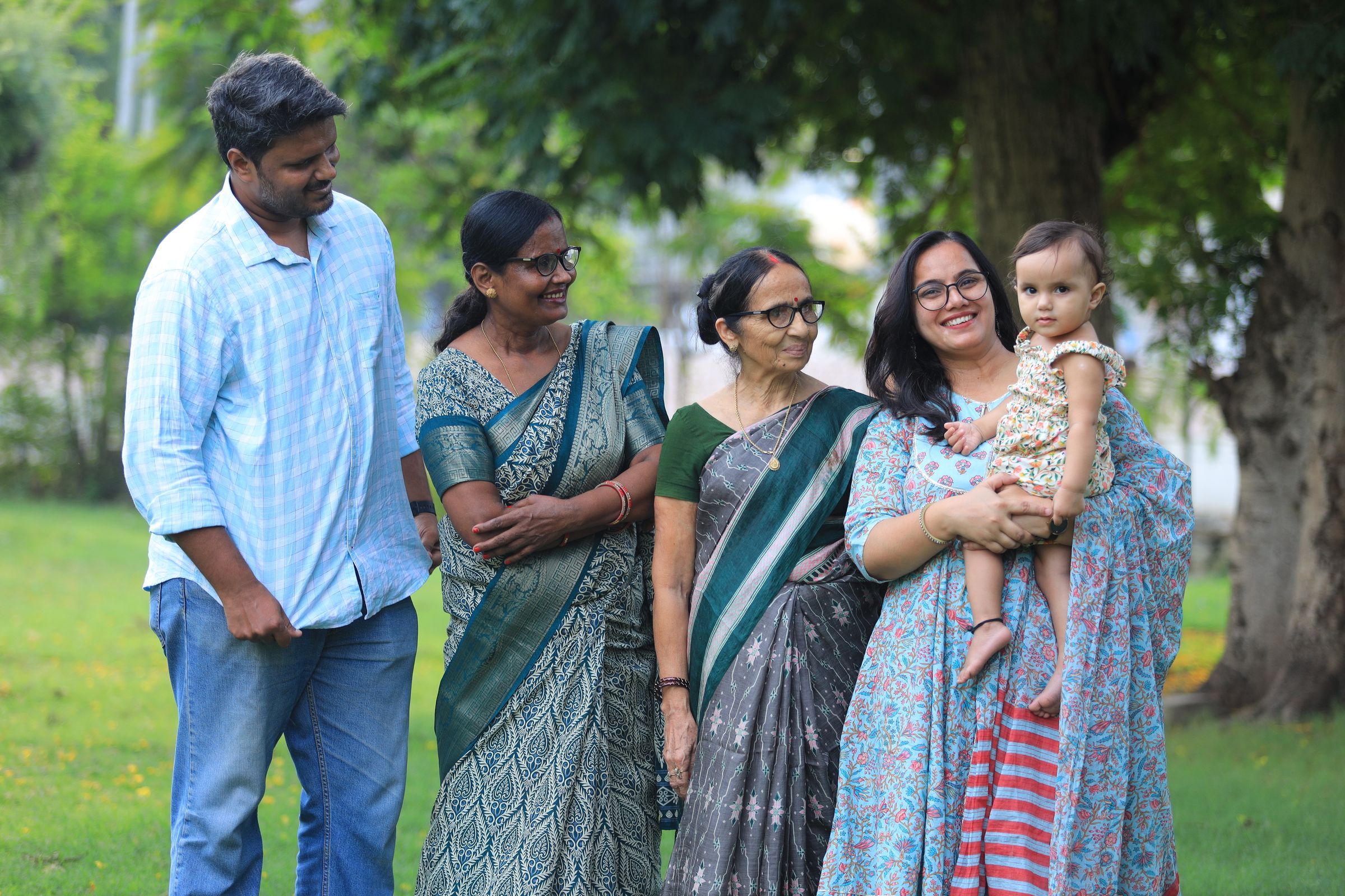 Three generations of an Indian family together outdoors